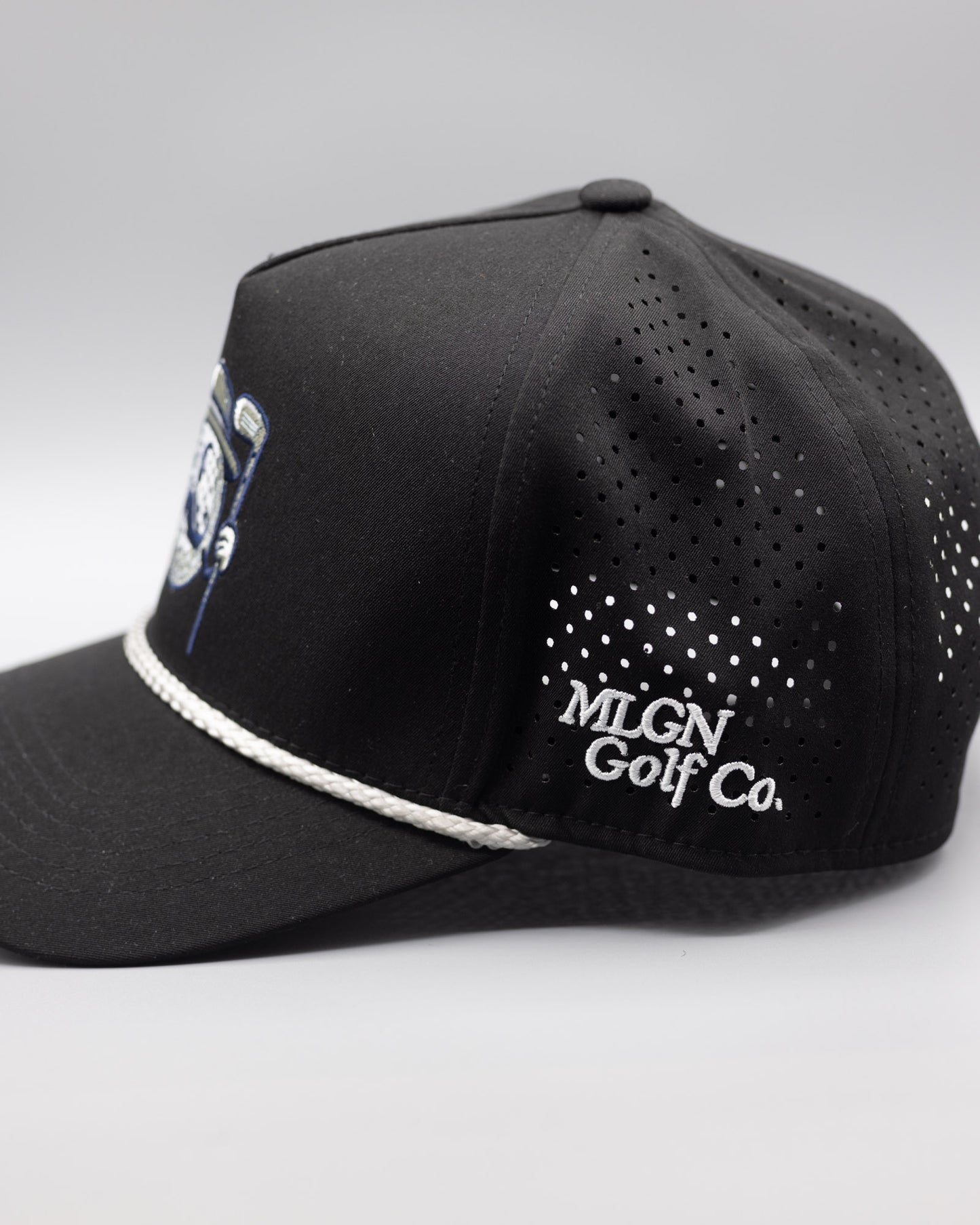 A black mesh golf hat with a grey rope and the MULLY logo centered on the crown with MLGN Golf Co. stitched on the right side.